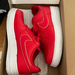 Nike Vibrant Red Sneakers with Gold Accents